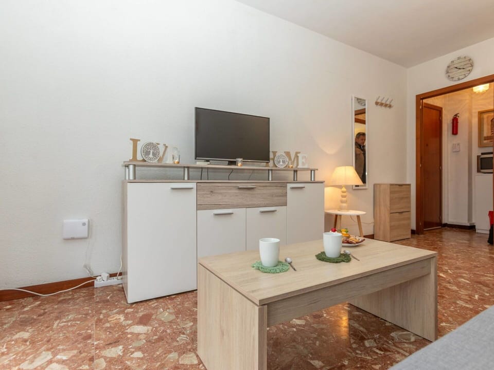 Furniture, Interior Design, Flooring, Wood, Floor, Room, Ceiling, Cabinetry, Table, Wood Flooring