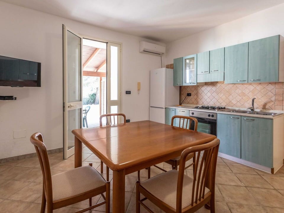 Table, Property, Furniture, Cabinetry, Azure, Chair, Wood, Flooring, Wood Stain, Floor