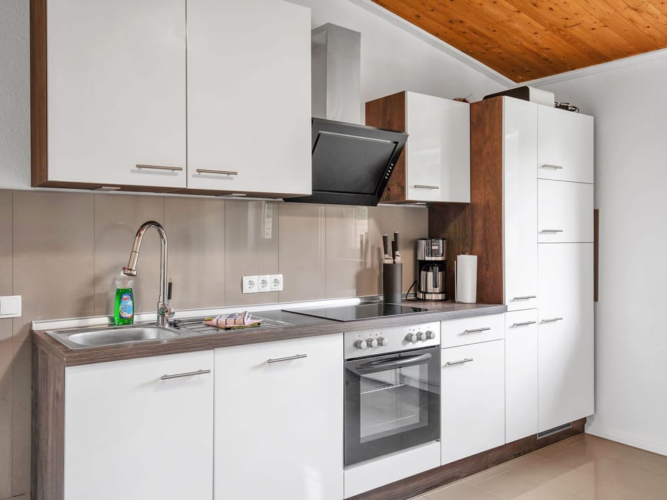 Cabinetry, Countertop, Kitchen Sink, Property, Sink, Building, Tap, Kitchen, Kitchen Stove, Wood