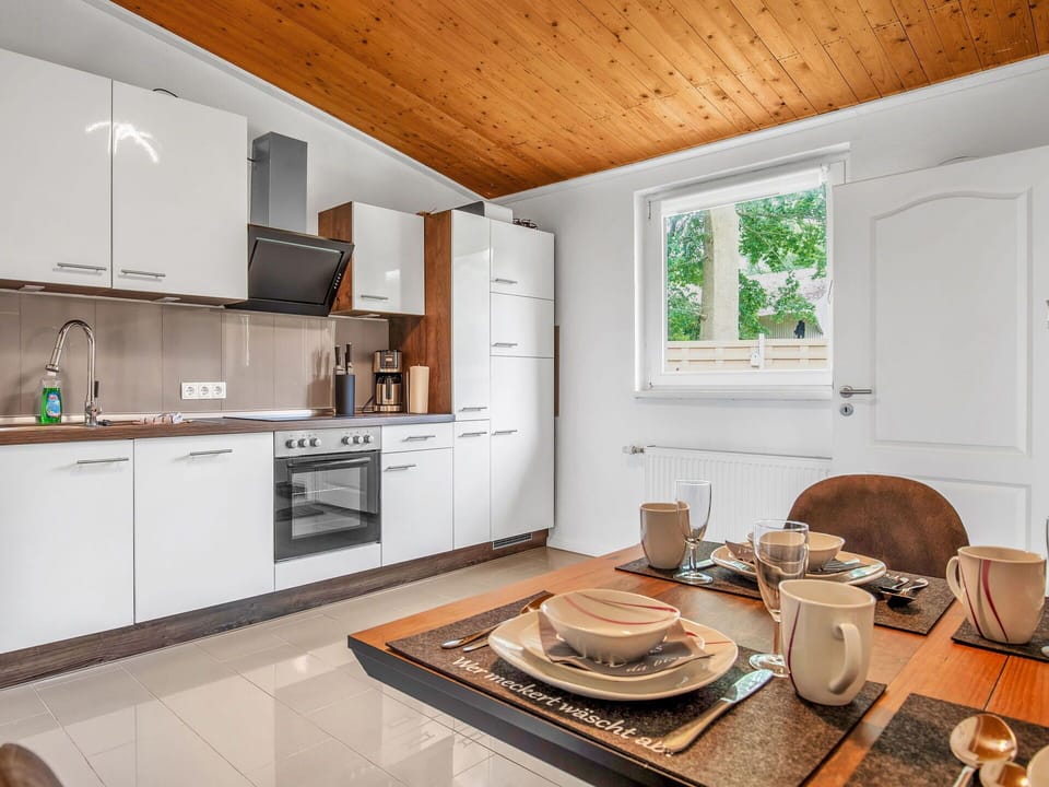 Cabinetry, Countertop, Property, Tableware, Kitchen Appliance, Dishware, Wood, Window, Building, Kitchen Stove