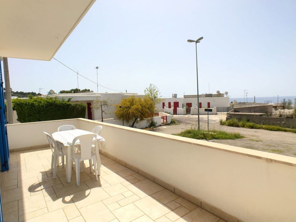 Sky, Plant, Street Light, Urban Design, Building, Residential Area, Road Surface, Flooring, Asphalt, Landscape