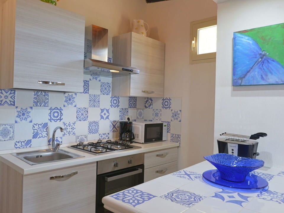 Cabinetry, Property, Furniture, Blue, Countertop, Kitchen Sink, Table, Sink, Azure, Interior Design
