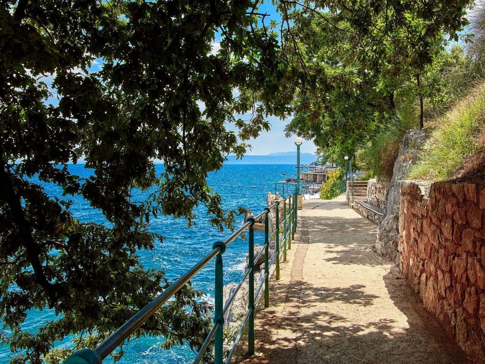 Water, Plant, Sky, Wood, Natural Landscape, Fence, Coastal And Oceanic Landforms, Tree, Road Surface, Landscape