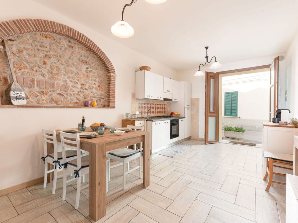 Sky, Furniture, Property, Table, Building, Chair, Shade, Interior Design, Outdoor Furniture, Window