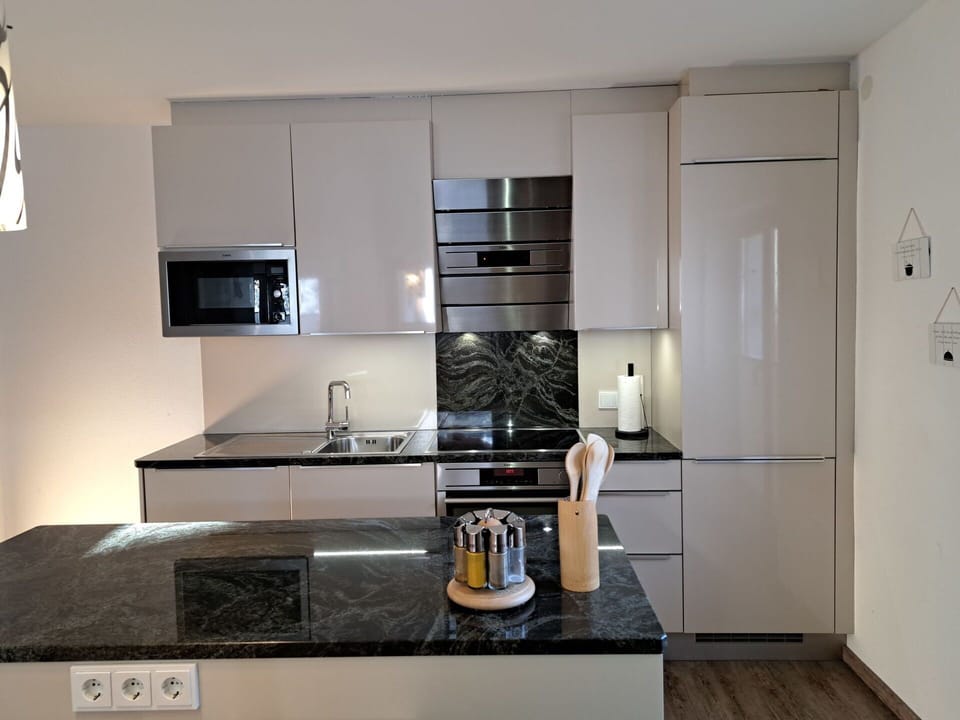 Cabinetry, Countertop, Property, Kitchen Sink, Kitchen Stove, Sink, Kitchen, Kitchen Appliance, Wood, Tap