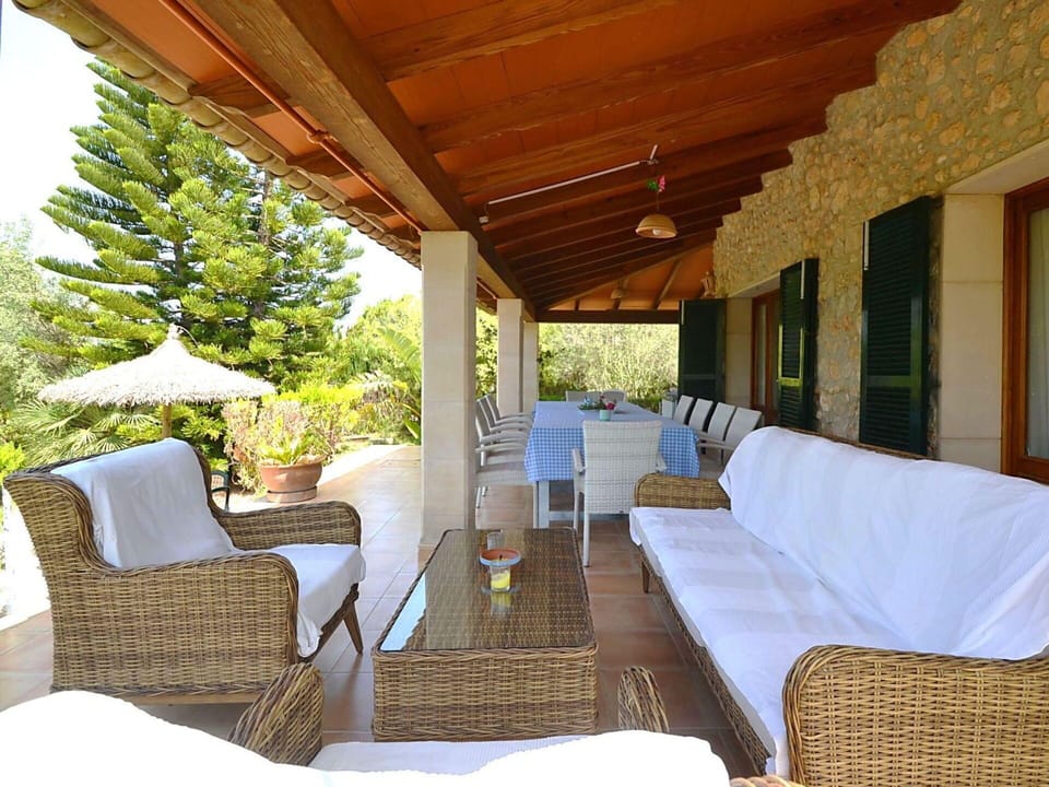Table, Sky, Furniture, Property, Plant, Chair, Outdoor Table, Outdoor Furniture, Tableware, Building