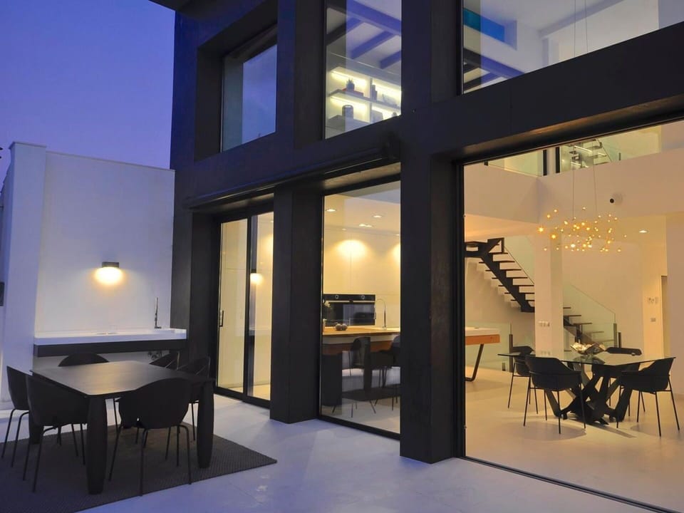 Table, Sky, Furniture, Property, Plant, Chair, Outdoor Table, Outdoor Furniture, Tableware, Building