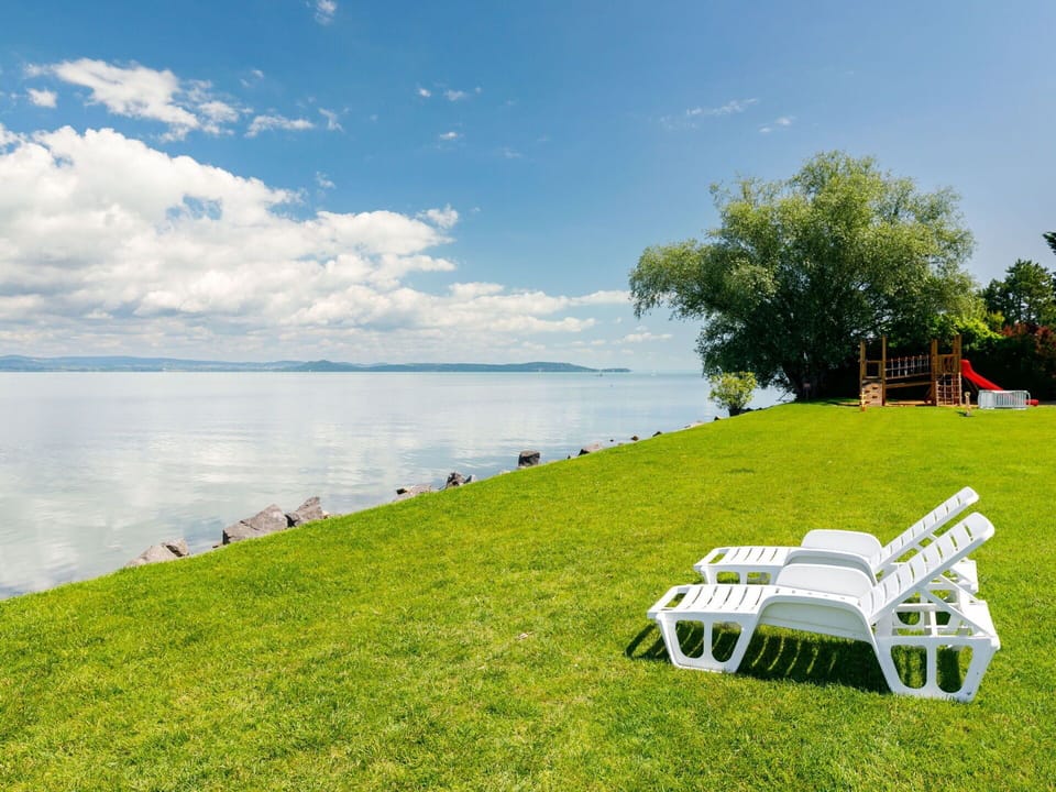 Water, Sky, Cloud, Plant, Tree, Natural Landscape, Grass, Outdoor Furniture, Lake, Leisure
