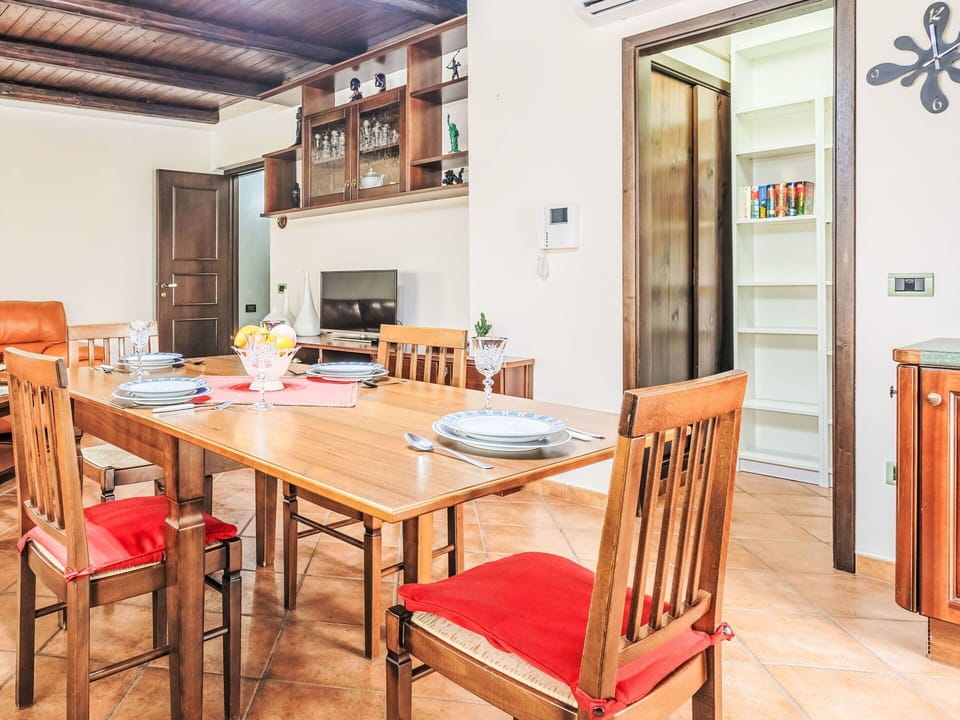Table, Furniture, Property, Chair, Wood, Cabinetry, Interior Design, Orange, Flooring, Floor