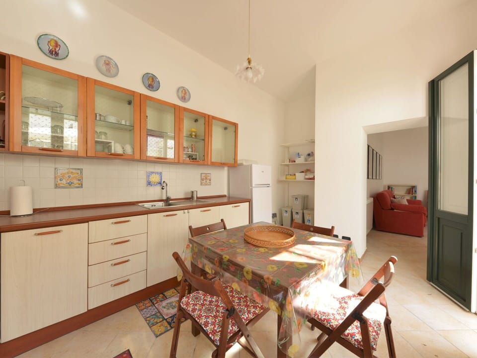 Furniture, Property, Table, Cabinetry, Wood, Picture Frame, Interior Design, Floor, Flooring, Shelf