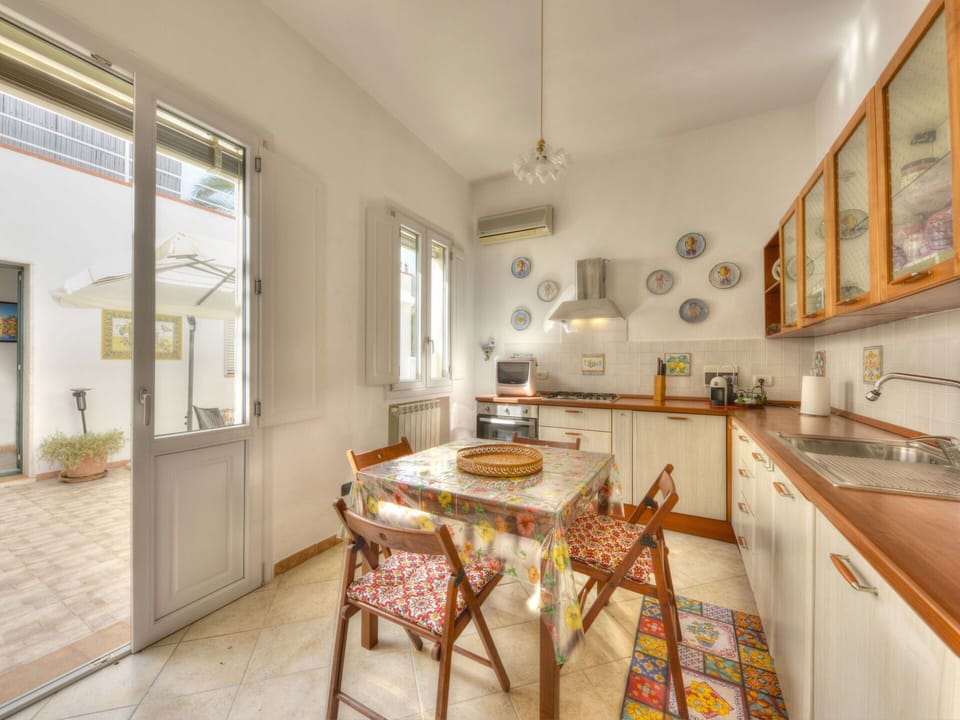Furniture, Cabinetry, Picture Frame, Table, Window, Plant, Wood, Kitchen, Interior Design, Flooring