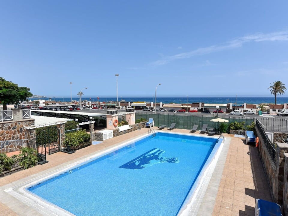 Water, Sky, Property, Plant, Swimming Pool, Building, Azure, Tree, Seaside Resort, Architecture