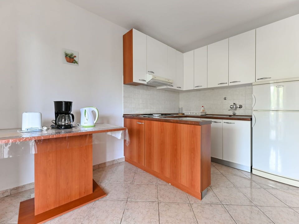 Cabinetry, Countertop, Building, Sink, Tap, Kitchen, Wood, House, Flooring, Floor