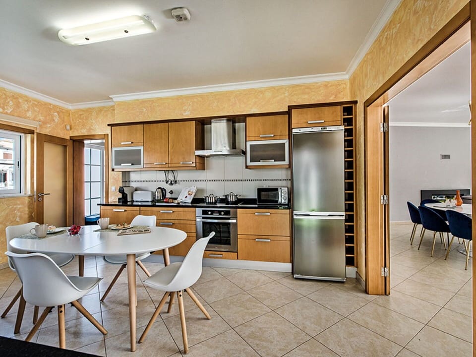 Furniture, Cabinetry, Countertop, Building, Chair, Wood, Kitchen Appliance, Kitchen, Kitchen Stove, Living Room