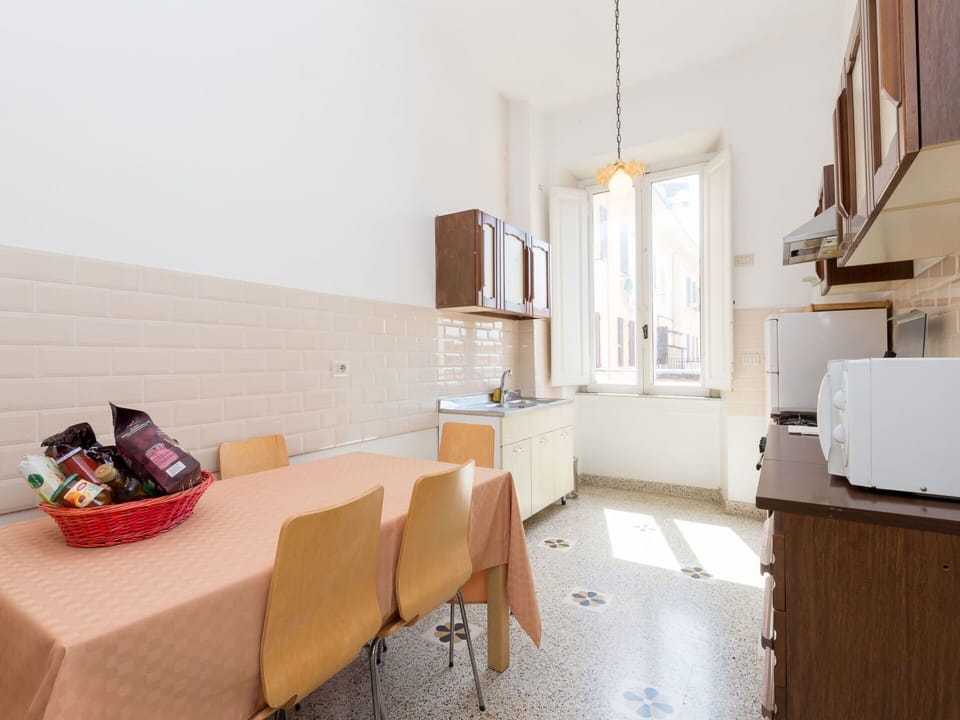 Furniture, Table, Wood, Window, Cabinetry, Building, Flooring, Kitchen, Floor, Chair
