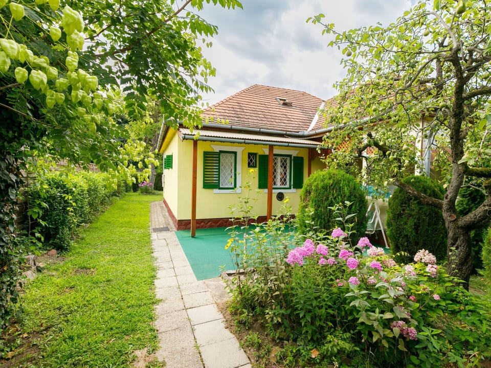 Plant, Building, Flower, Property, Window, Nature, Natural Landscape, House, Tree, Sky