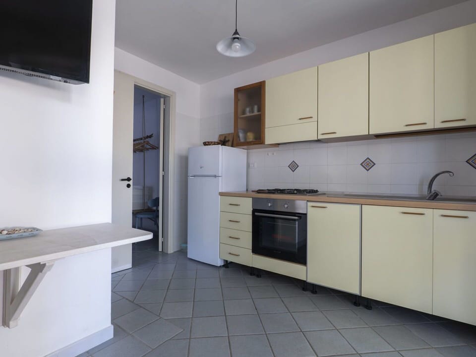 Cabinetry, Property, Countertop, Furniture, Building, Kitchen Stove, Drawer, Wood, Interior Design, Kitchen