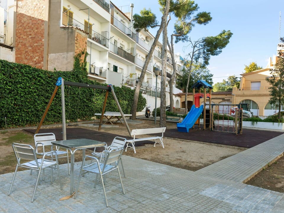 Plant, Building, Property, Furniture, Sky, Window, Table, Tree, Road Surface, Outdoor Furniture