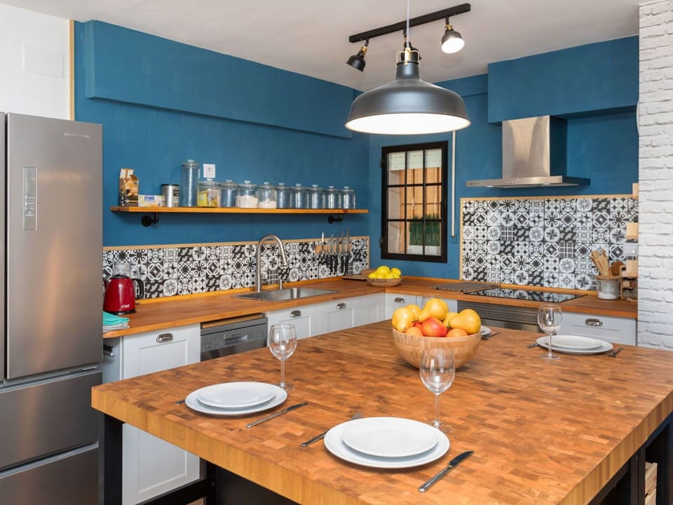 Table, Furniture, Tableware, Property, Cabinetry, Wood, Countertop, Interior Design, Lighting, Drinkware