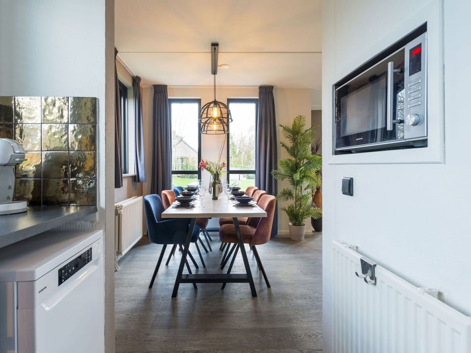 Table, Furniture, Property, Plant, Cabinetry, Wood, Interior Design, Lighting, Houseplant, Floor