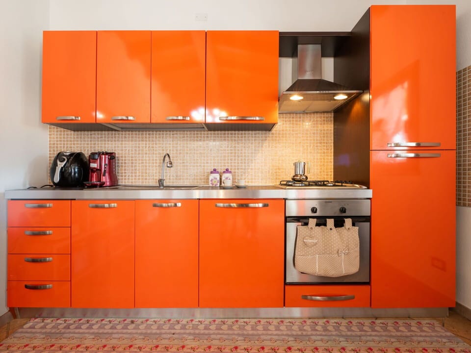 Cabinetry, Property, Countertop, Building, Kitchen Appliance, Kitchen, Orange, Wood, Kitchen Stove, Interior Design