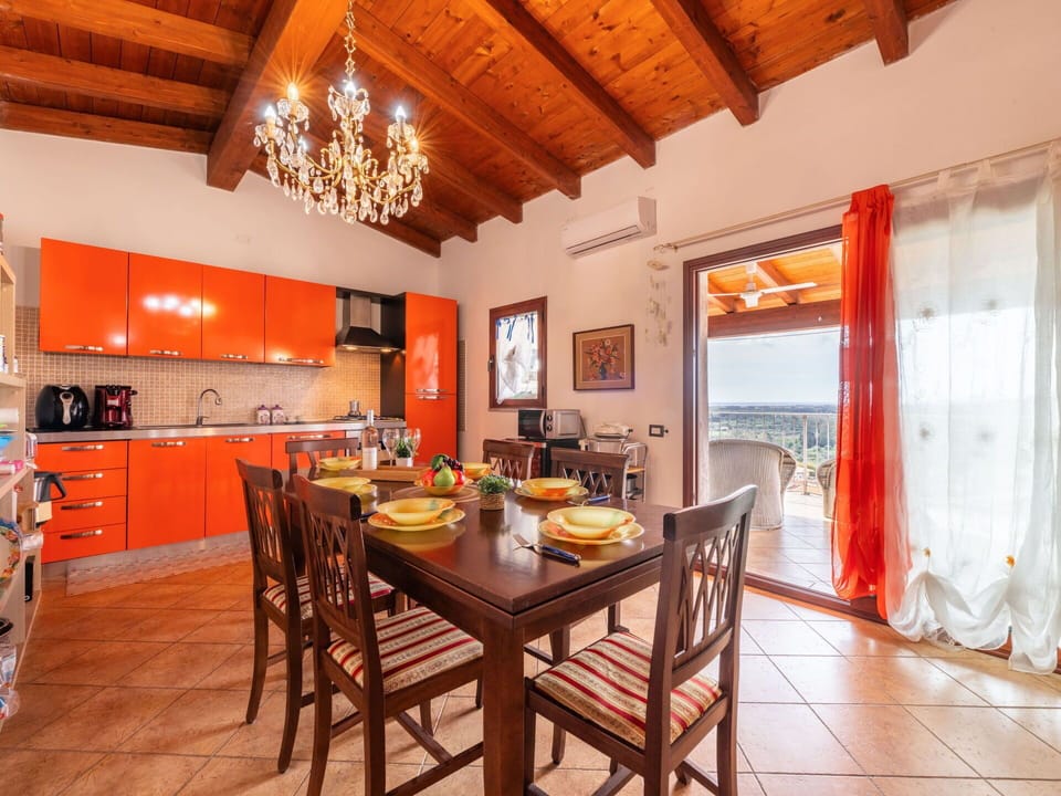 Table, Furniture, Property, Wood, Interior Design, Orange, Chair, Lighting, Flooring, Building