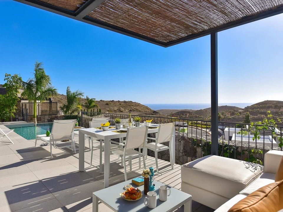 Sky, Table, Furniture, Property, Chair, Azure, Shade, Outdoor Furniture, Flowerpot, Interior Design