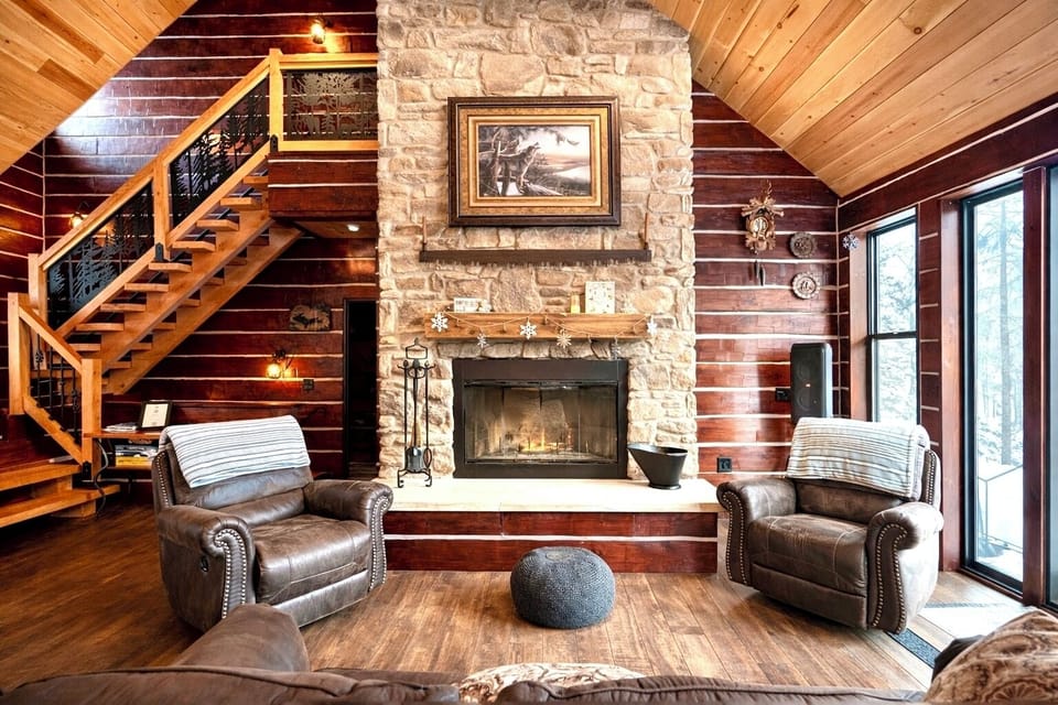 Wood Fireplace, 2 recliners and sofa provide the perfect space with views