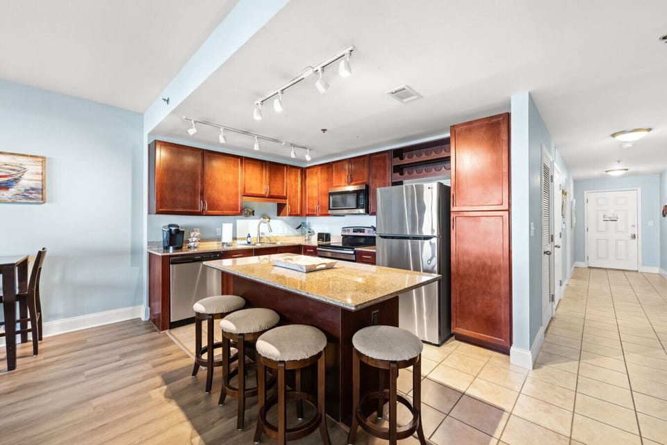 Fully Stocked Kitchen with Stainless Steel Appliances, Keurig Coffee Maker and Island Bar Seating