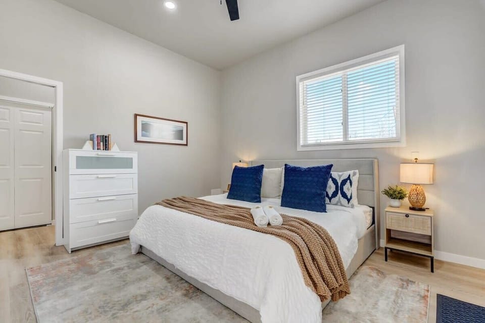 Modern bedroom with the most comfortable King bed as a retreat after whole day of adventure.