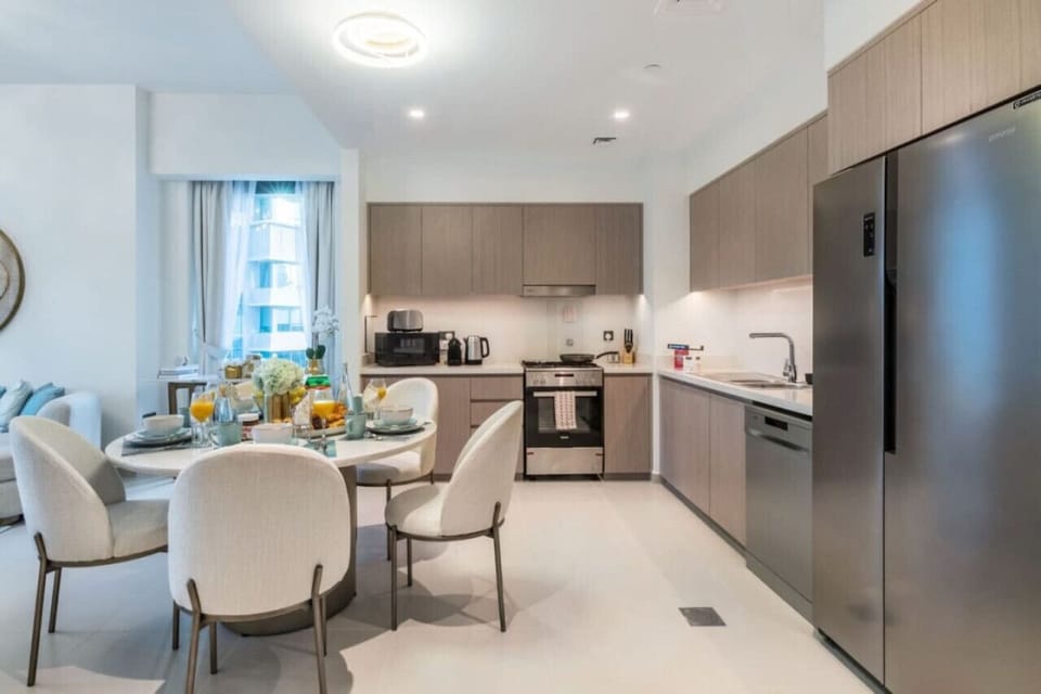 Kitchen: Modern flair with sleek appliances, perfect for culinary adventures and social meals!