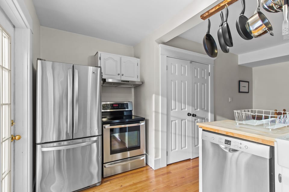 Whip up delicious meals with ease using the modern stainless steel appliances and ample counter space.