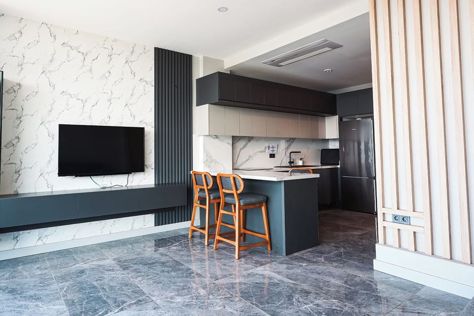 Family Condo | Premium bedding, desk, laptop workspace, blackout drapes