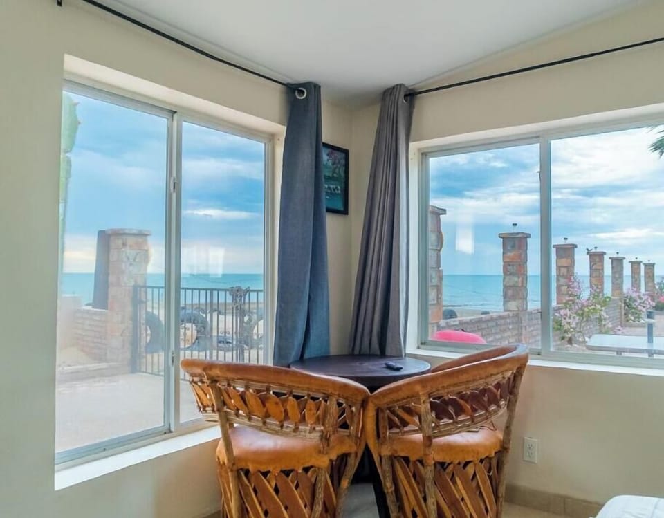 Bright & airy vacation rental studio with large windows & stunning panoramic views at Rancho Percebu, San Felipe Baja California. Let the Sea of Cortez light up your stay!