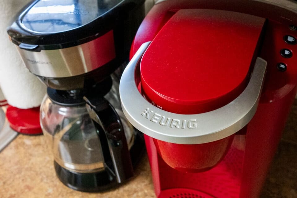 A Keurig and standard coffee pot are both included.