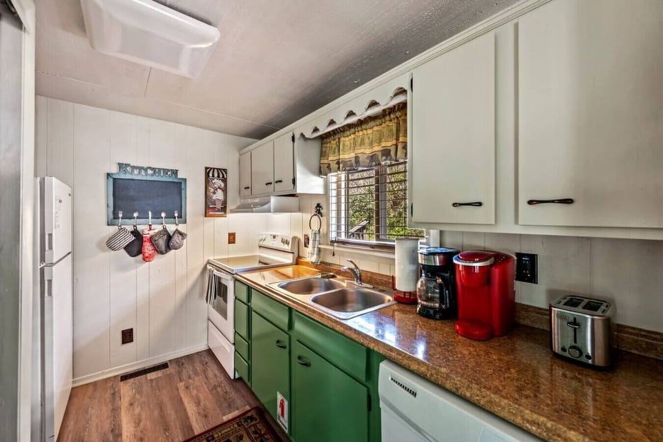 Kitchen includes a full suite of appliances as well as pots/pans, cookware, silverware, and more.