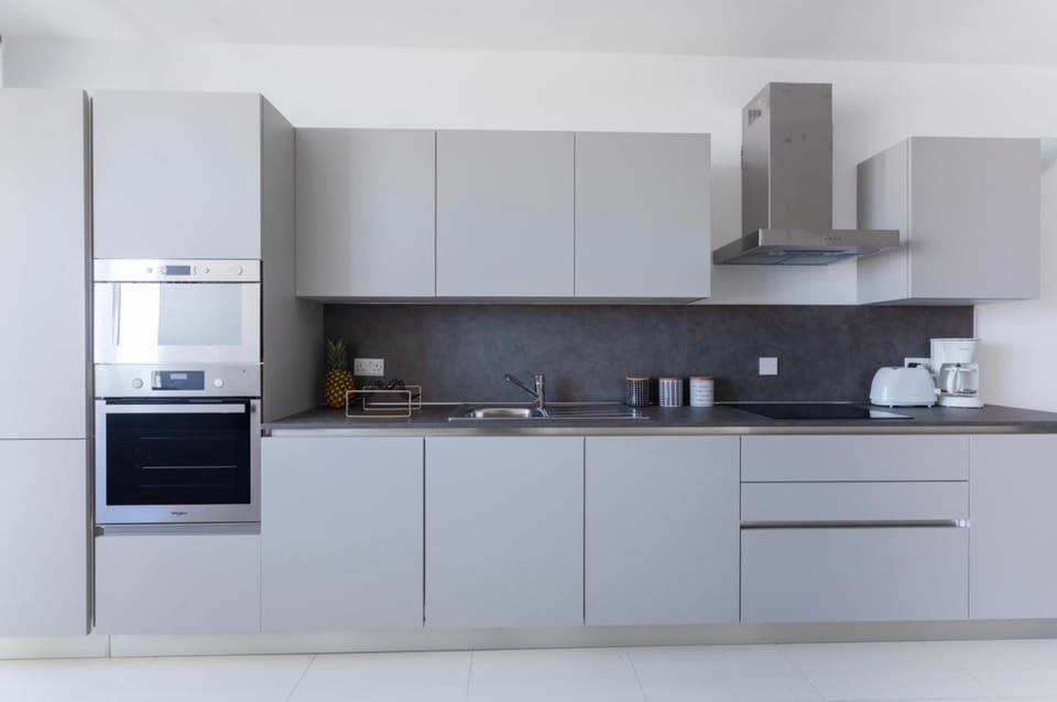 The kitchen is fully equipped to prepare a simple meal