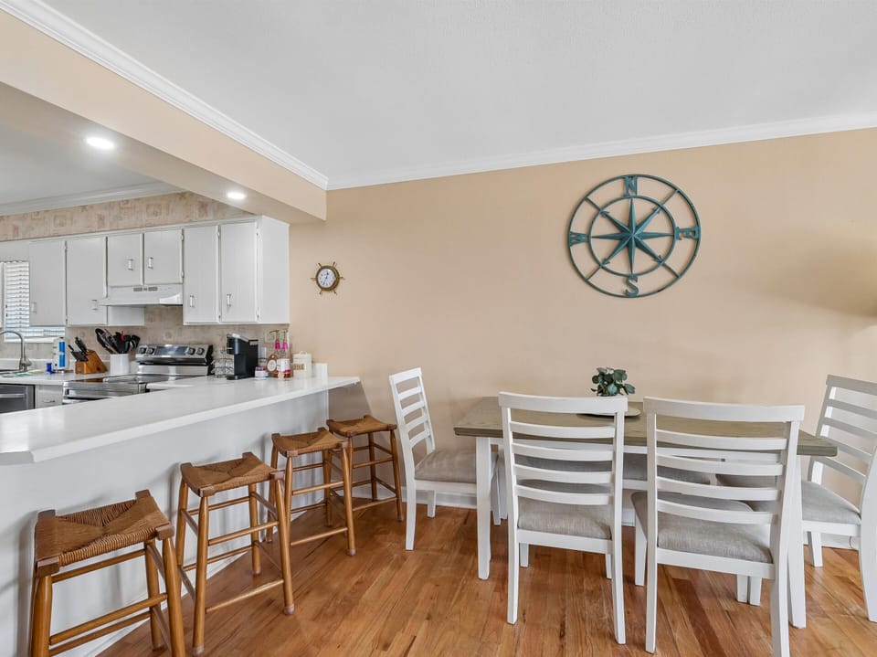 Dining Area - Table Seating Four + Breakfast Bar