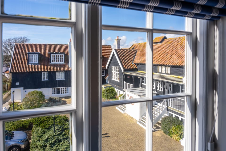 The bedrooms come with further sea views and overlook the courtyard of the country club