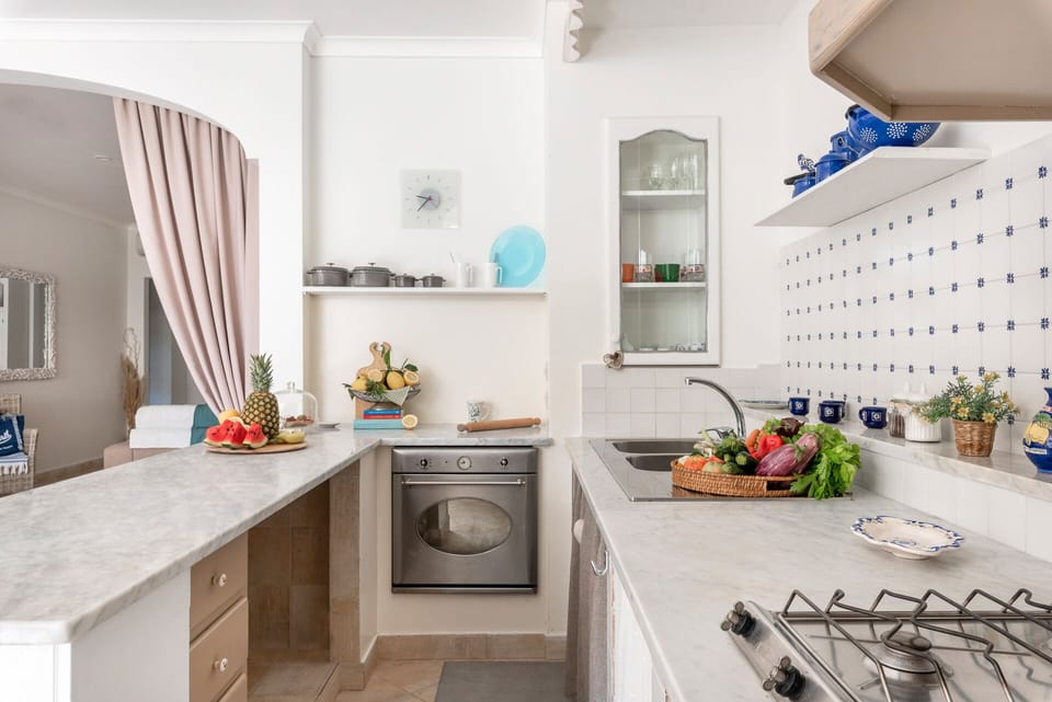 Comfort Apartment | Private kitchen | Full-size fridge, microwave, oven, stovetop