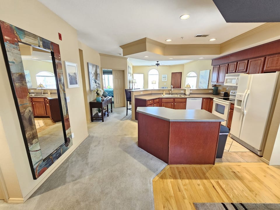 Overview of the kitchen and living room from the dining room table!