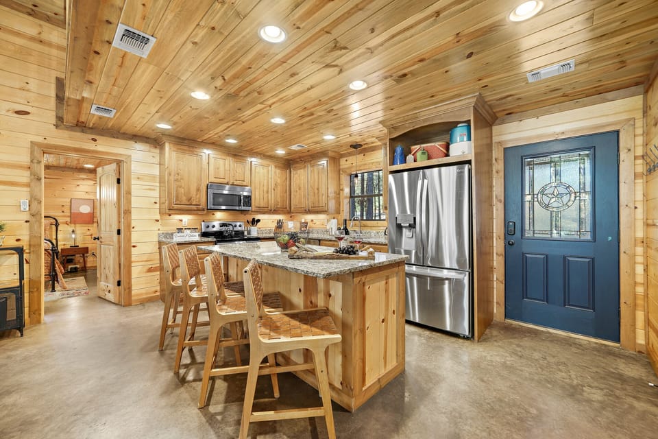 Barstool seating for 4 at the kitchen island supplements dining seat and provides a great spot for breakfast, hot beverages, snacks, or lunch.