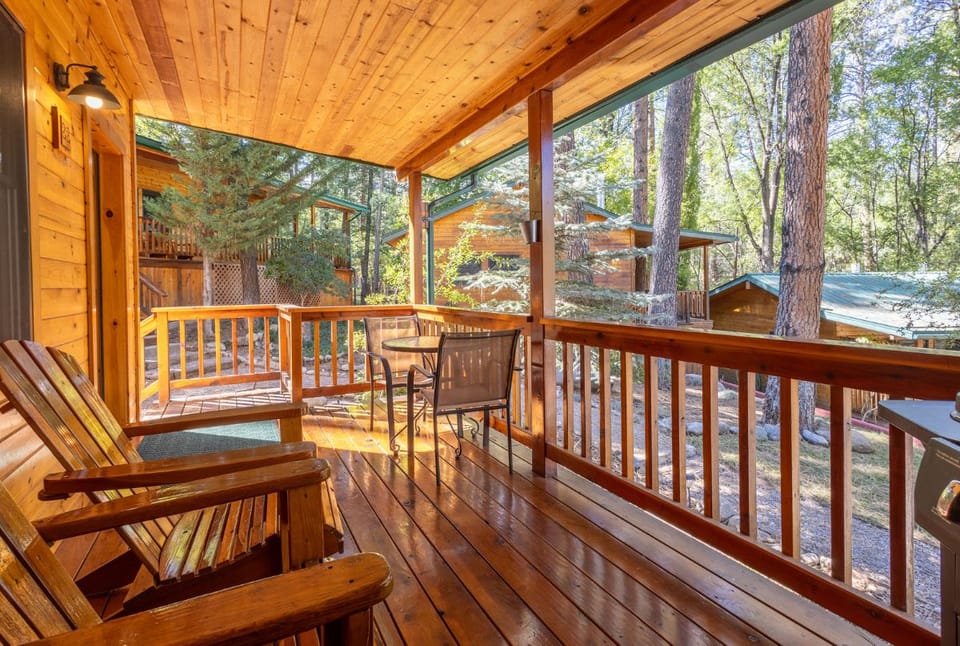 Relax on the cozy viewing deck at Bear's Creek, where you can soak in the peaceful forest surroundings. Enjoy your morning coffee or evening glass of wine just minutes from Ruidoso.