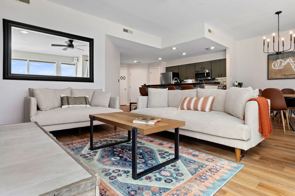 There is plenty of seating in the living room with this comfy couch & love seat.