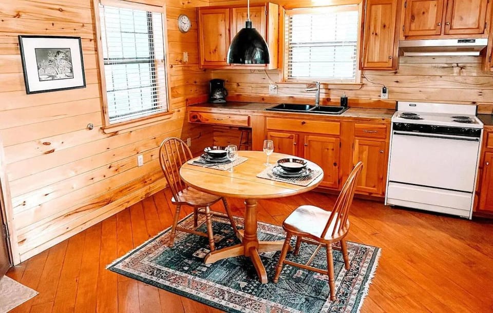 Enjoy home-cooked meals in the cozy kitchen and dining area. The fully equipped kitchen features modern appliances, ample counter space, and all the essentials you need to prepare your favorit