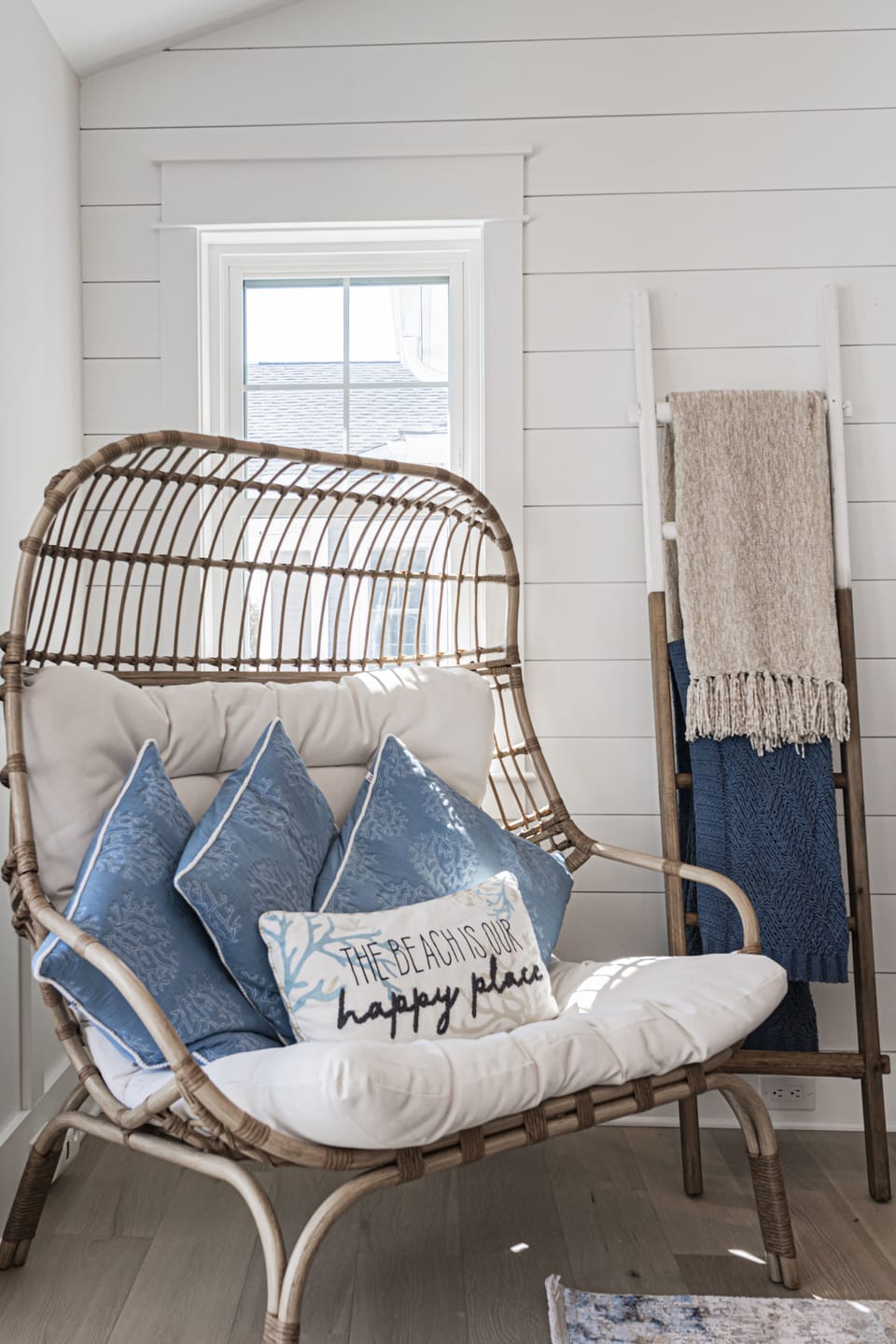 Cozy Coastal Reading Nook with Plush Pillows