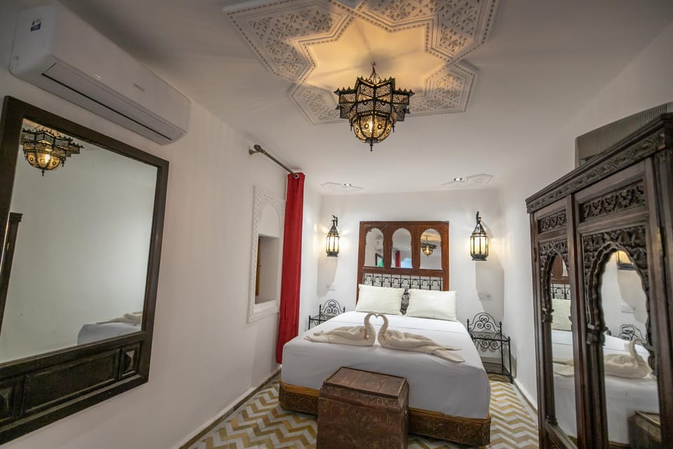 Deluxe Triple Room, Courtyard View | In-room safe, WiFi (free)