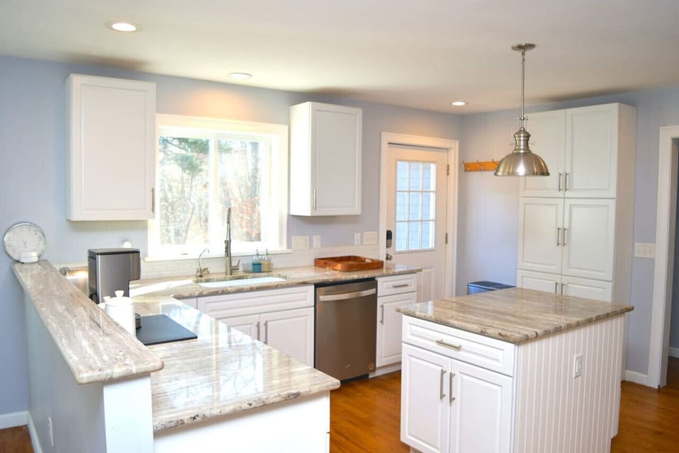 Front entrance goes through this kitchen area