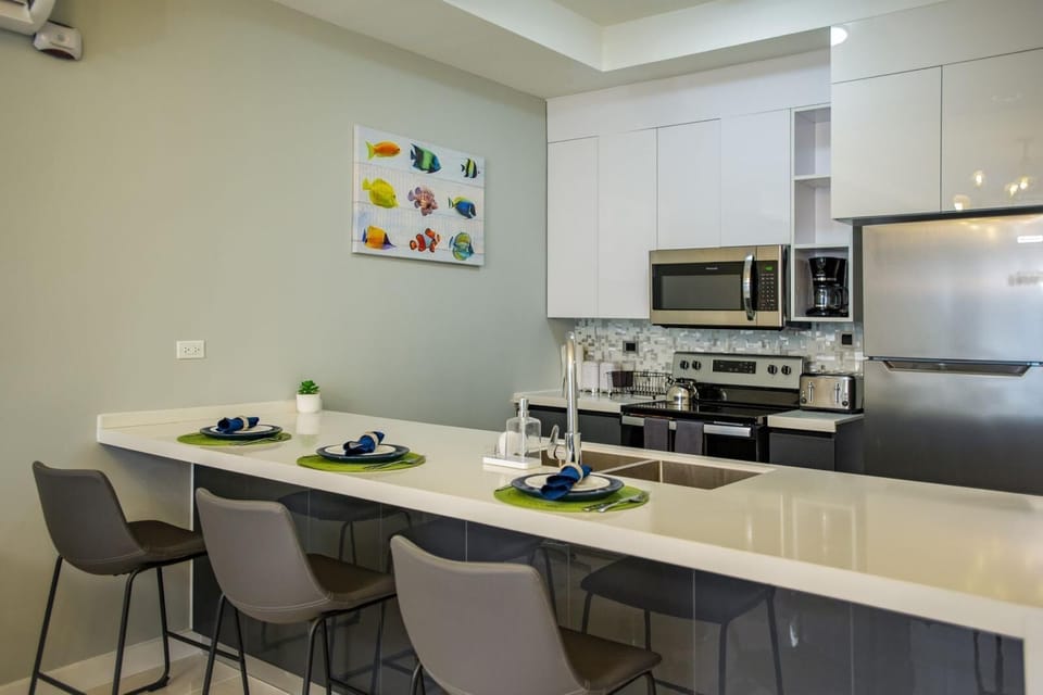 Comfort Apartment | Private kitchen | Full-size fridge, microwave, oven, electric kettle