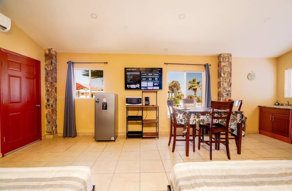 Beachfront vacation rental studio with living room & TV in Rancho Percebu, San Felipe. Kick back, relax & enjoy the Sea of Cortez vibes!
